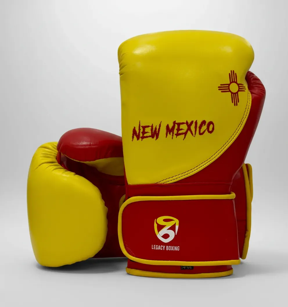 Quickfire Max velcro boxing gloves with a reshaped wrist strap and curved custom backhand panel shown in a blank layout.